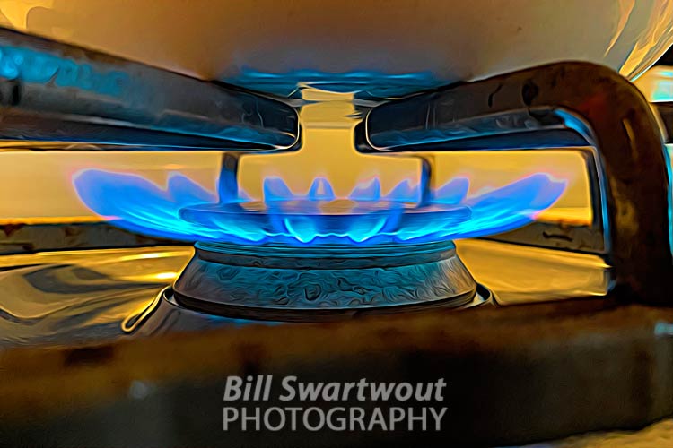 Blue Flams heating the Tea Pot